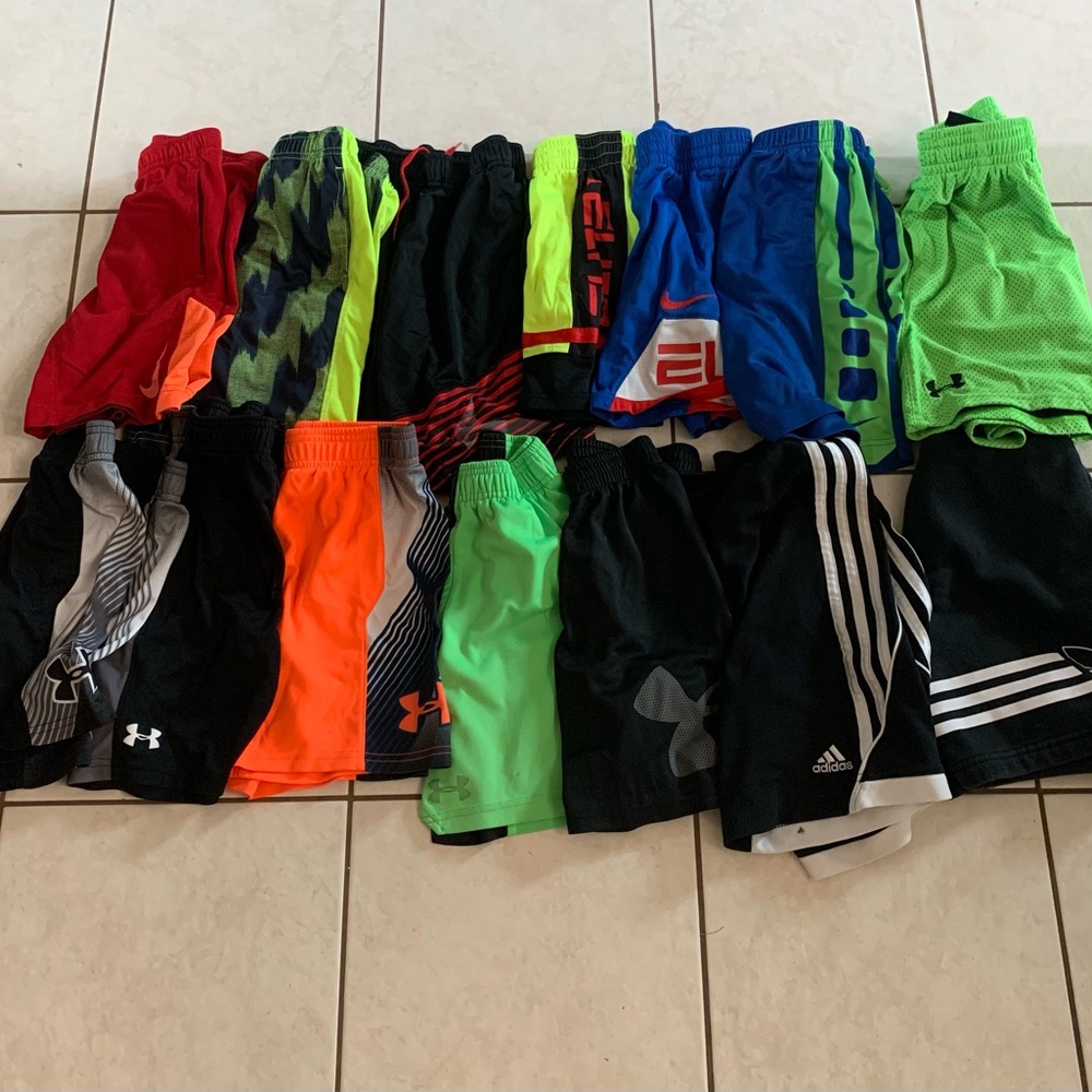 14 Youth athletic shorts. All of them size youth XS / 7.
